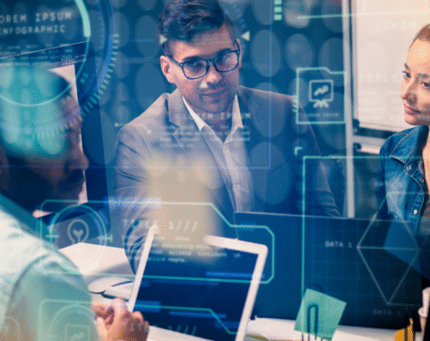 Business team using custom software tools to automate and streamline operations in a modern workspace